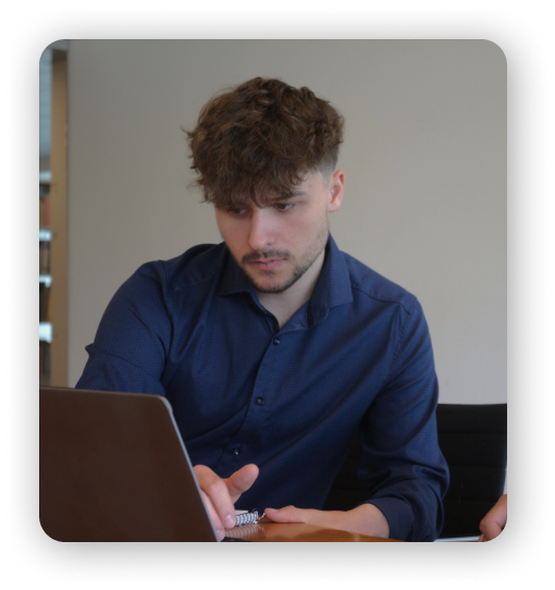 Gergo Mezes, Founder of Once Advertisements working on his MacBook Air.